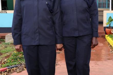 Newly graduated officer pose for a photo